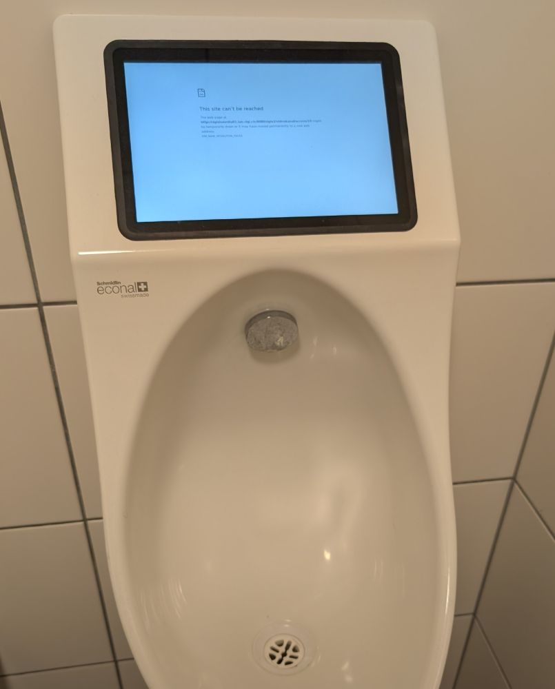 An internet-connected urinal, with the internet apparently disconnected.