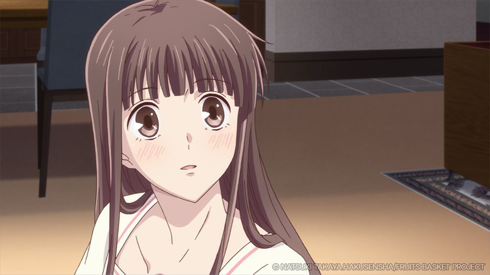 A close-up of Tohru from Fruits Basket, blushing.