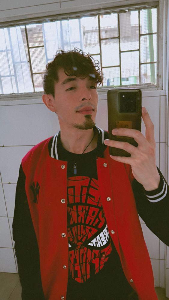 Sefie of user wearing color-coordinated Spiderman outfit.