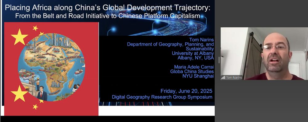 Zoom screenshot: to the right an image of Tom Narins who is wearing a dark red tshirt and glasses. The background is a door and a white wall. To the left is a title slide showing author details, a map of Africa with the Chinese flag, and the title: Placing Africa along China’s Global Development Trajectory: From the Belt and Road Initiative to Chinese Platform Capitalism