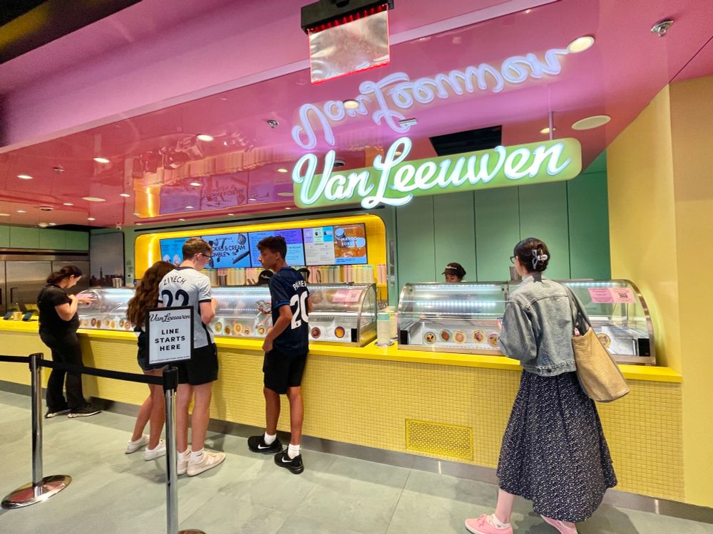 People waiting in line inside Van Leeuwen for ice cream.