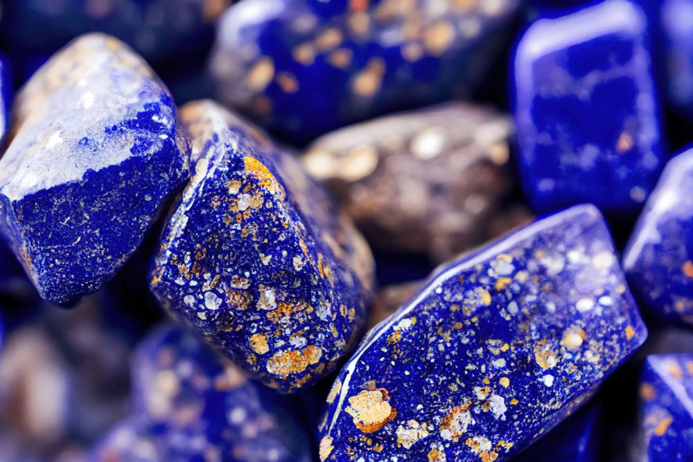 Lapis Lazuli stones I took inspiration from! Source: https://spinnaker-watches.com/blogs/deep-time-chronicles/lapis-lazuli-carvings-and-sculptures-unveiling-the-artistic-potential