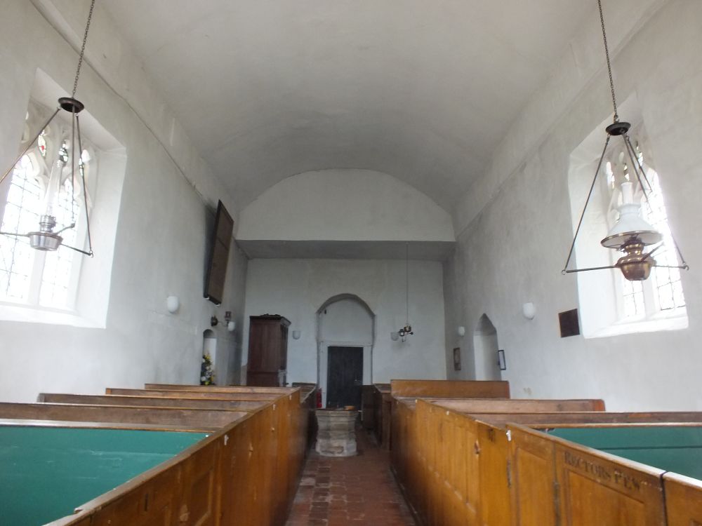 Looking W to the tower. Ceiling below roof. Dropped section before W wall.