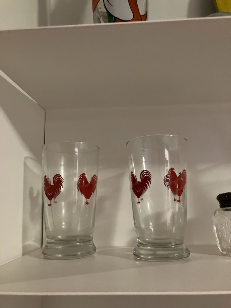 glasses with red roosters on them