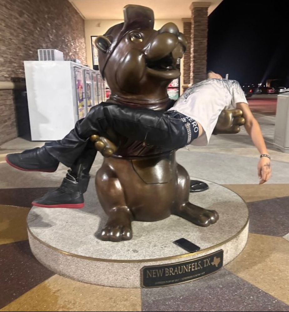 Buc-ee's Pieta: a dude doing a dead jesus in the arms of a bronze beaver in New Braunfels, TX/