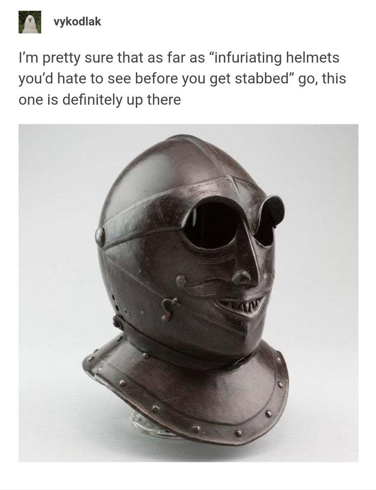 vykodlak on tumblr:  "I'm pretty sure that as far as "infuriating helmets you'd hate to see before you get stabbed" go, this one is definitely up there"

A helmet with two separate hooded eye-holes a molded nose and a smirking little mouth full of pointy teeth. It's as close to a goblin as a 1620s German Savoyard helmet could ever be. You can almost *hear* the maniacal laughter. 
