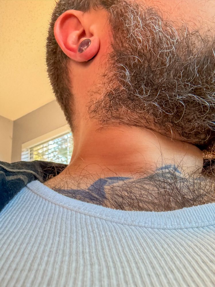 close-up of my neck region. love to see a man’s hair poking up out of the back or front of his shirt and I’m doing my part to keep this great tradition alive