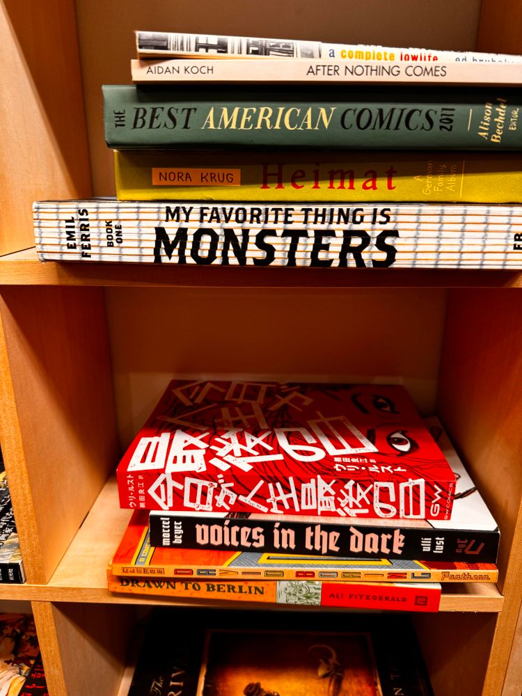 Bookshelf with western comics and a copy of the Japanese edition of my comic „Today is the last day of the rest of my life“. 