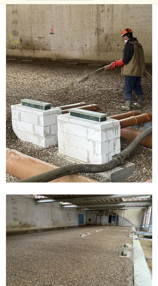 Guy spraying seashells in a building.