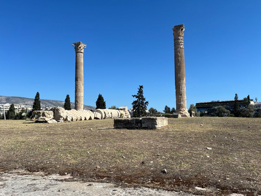 Two more massive, free-standing columns flank a fallen column which, according to a plaque (not pictured) fell after a storm in 1852 CE.  Wikipedia informs me construction was stated in 520 BCE, halted several times for hundreds of years and completed around 118 CE.