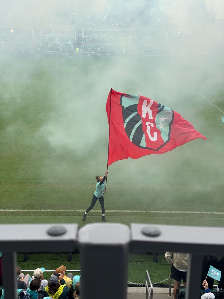 Kansas City Current flag being waved