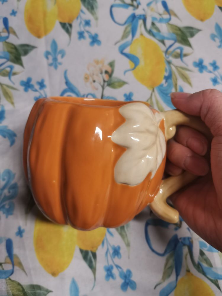A pumpkin shaped mug