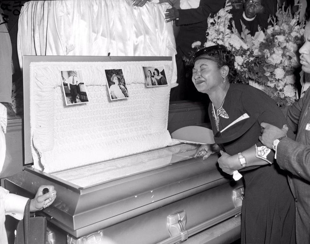 A famous picture of Mamie Till weeping over her son’s open casket. 