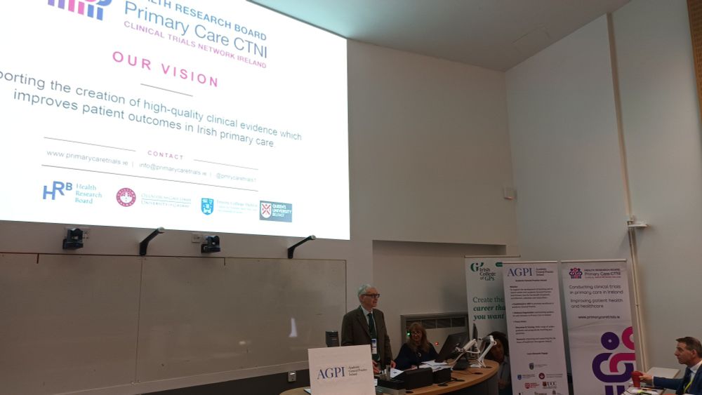 Prof Andrew Murphy introducing Prof Caroline Mitchell at the agpi 2025 conference in Queens university Belfast 