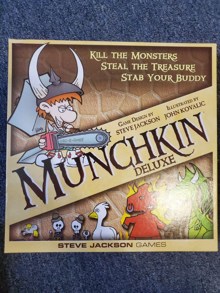 Munchkin deluxe board game box Steve Jackson games.