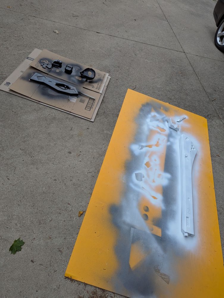 Assortment of cosplay parts with base layer painting completed