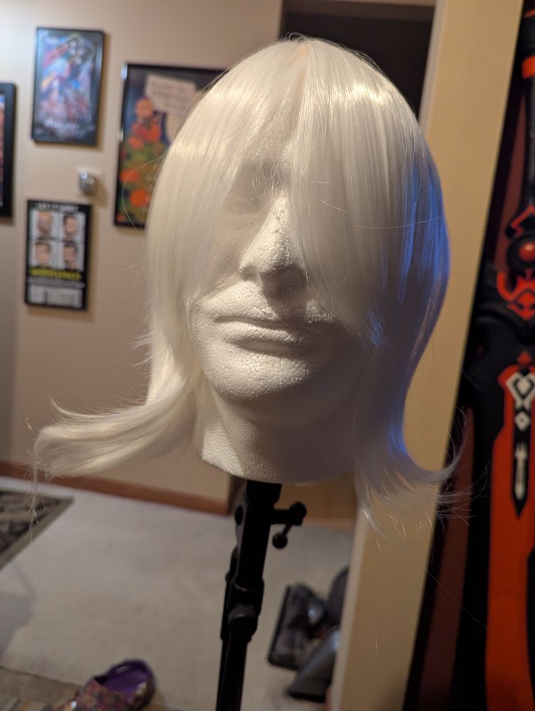 Extremely cheap white wig that has weirdly long chunks