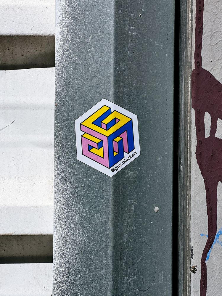 A sticker on metal. Geometrical design.