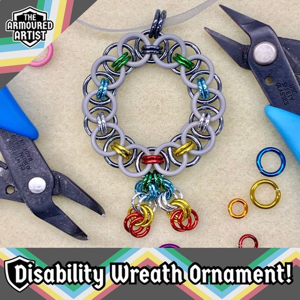 A disability pride squishable chainmail wreath ornament! Available on my Etsy!