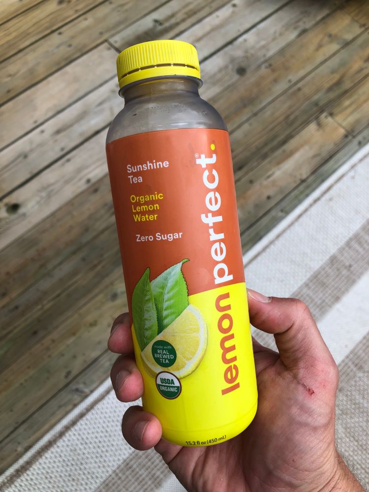 A bottle of Lemon Perfect, a gluten free non GMO beverage made with Stevia extract and ass.