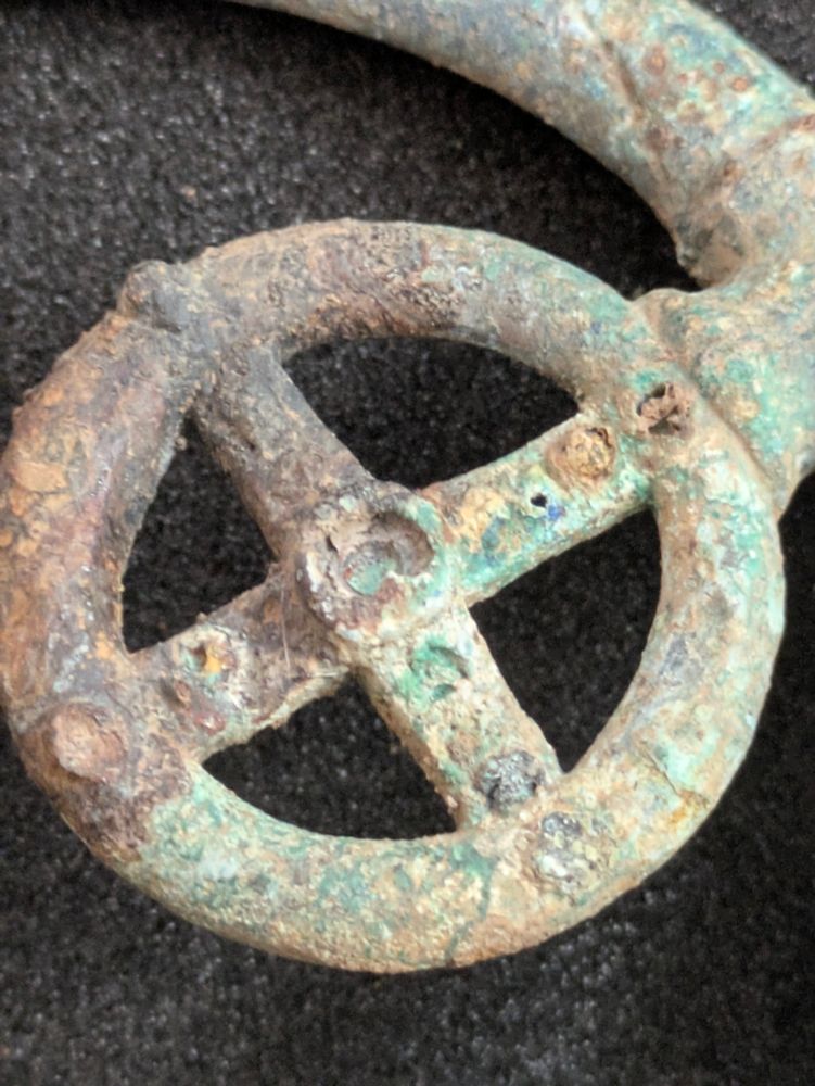 Detail of a ring-and-cross on the bridle with enamel detail