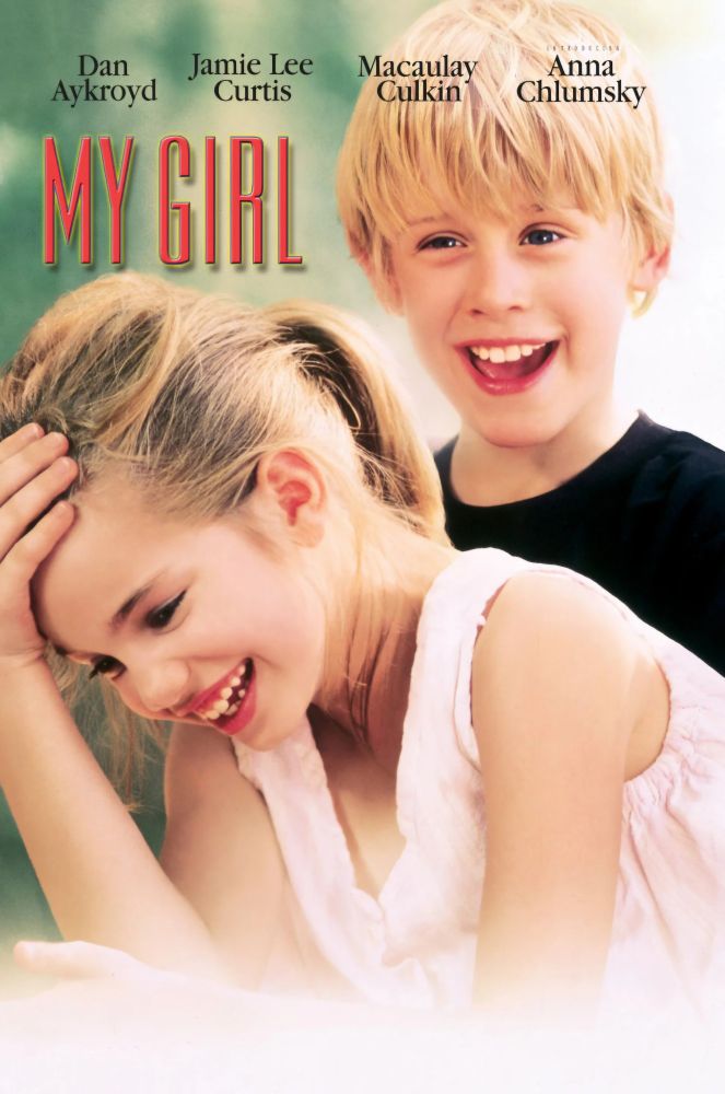 A boy and girl laughing. Starring Dan Akroyd, Jaime Lee Curtis, Macaulay Culkin, Anna Chlumsky.