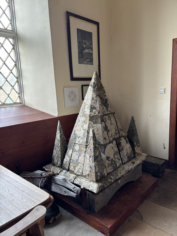 The church tower that was removed (it’s a pointed stone pyramid with 4 small pyramids, one at each corner of the base. sits about 1.5m high.