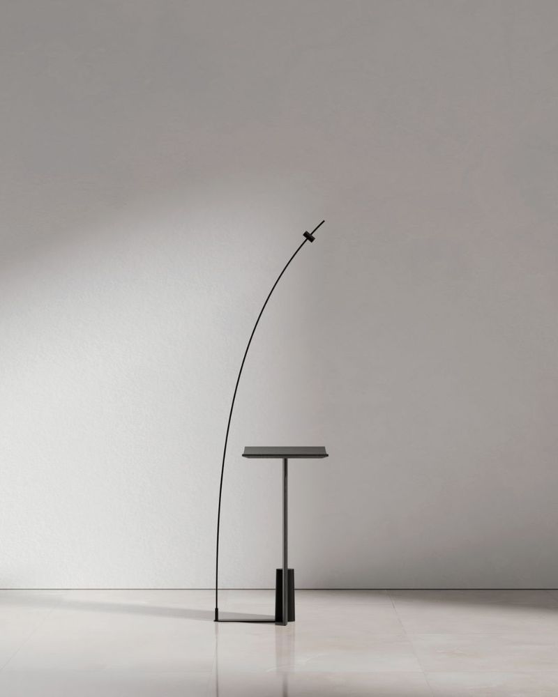 Ardea side table by Giuseppe Campanale is a minimalist piece featuring a “hidden” element that brings fresh expression and function to one of the most underestimated pieces of furniture.
