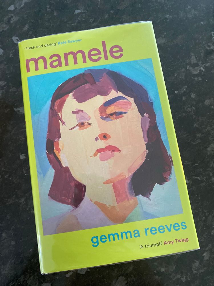 Book cover of Mamele by Gemma Reeves that features a painting of a woman’s face over a brat-green background