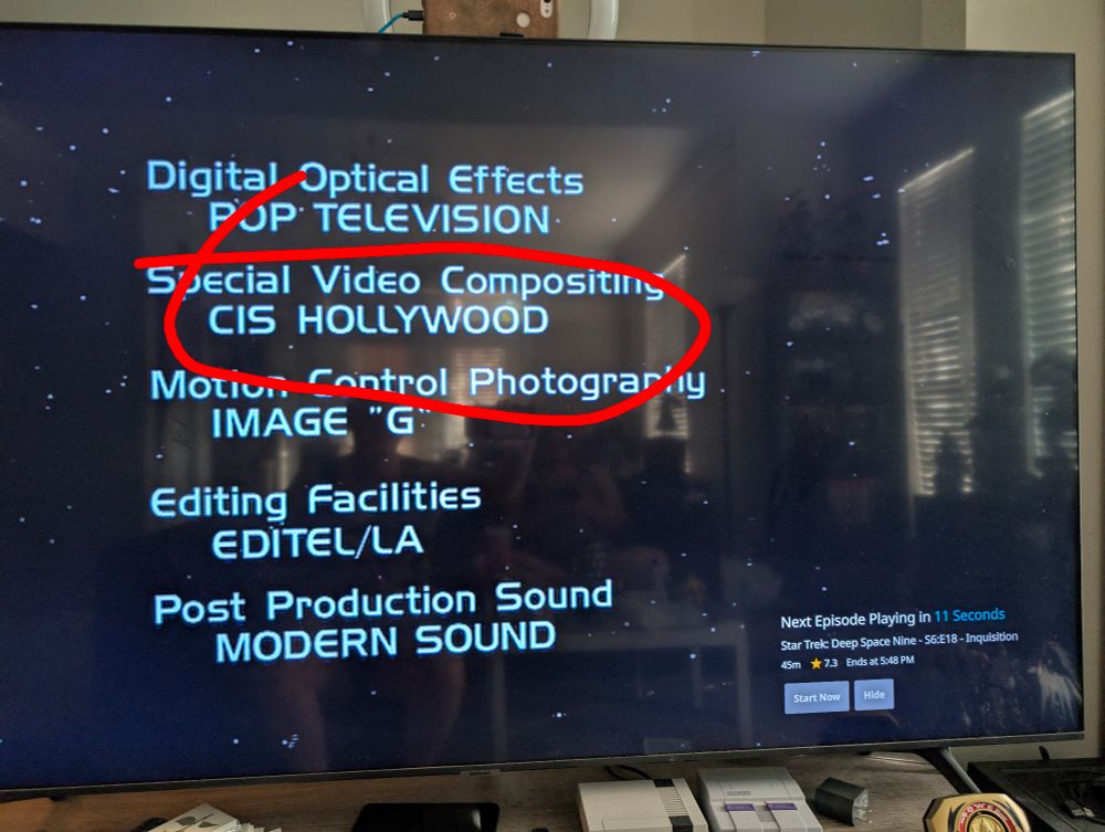 A picture of a TV displaying the end credits of the television show Star Trek Deep Space Nine with a big red circle around the special video compositing credit which is credited to CIS HOLLYWOOD. 
