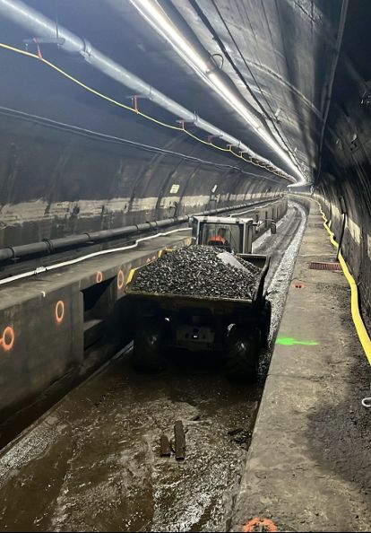 A tiny dump truck filled with rubble in East River Tunnel line 2. Photo: Amtrak.