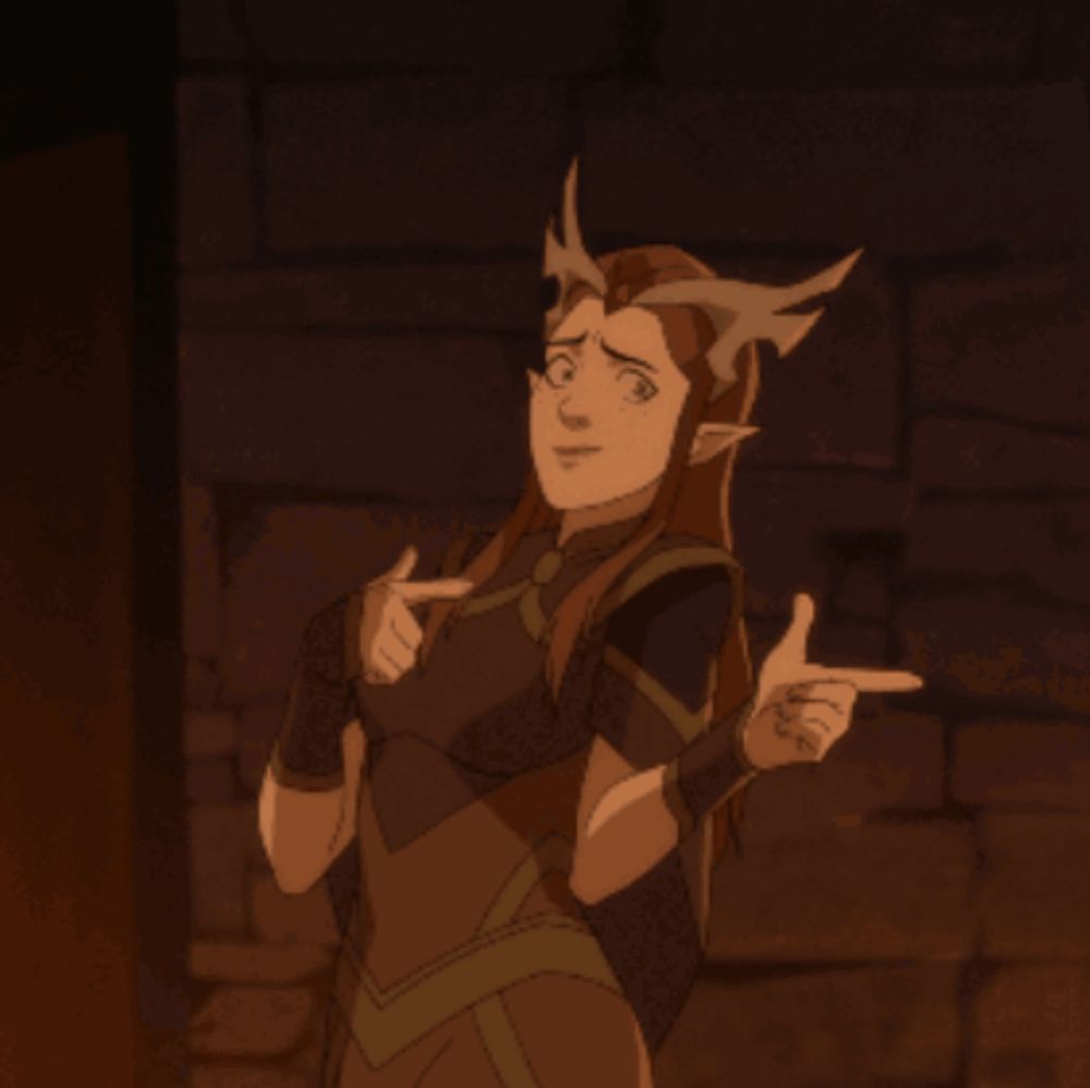 a cartoon character with horns on her head is pointing