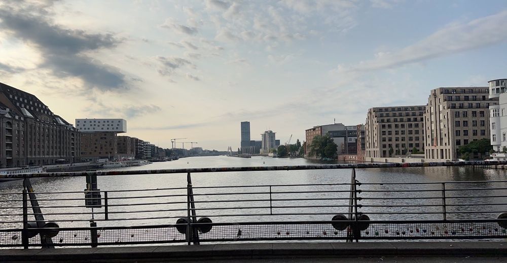 A view looking down the river from the bridge near Waschauer Straße station 