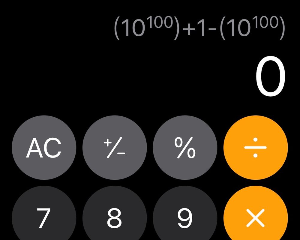 L'appli calculatrice d'iOS, montrant le calcul "10 puissance 100, plus un, moins 10 puissance 100"
Et le résultat incorrect "0"