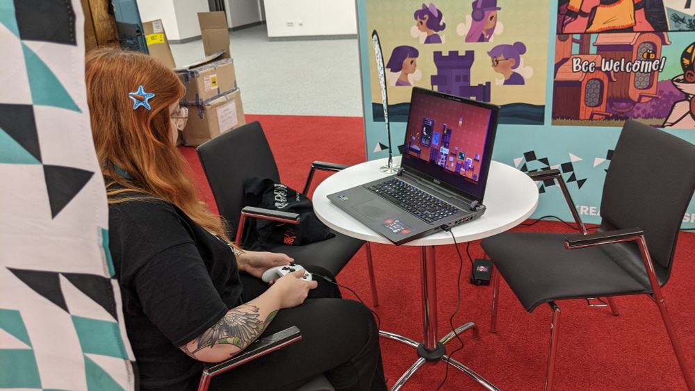 Someone playing the Blueberry demo on a Windows laptop using an Xbox controller