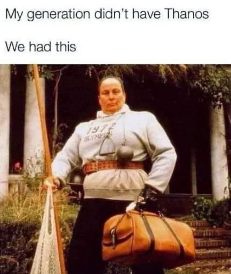 Miss Trunchbull wearing a 1972 olympics top with a hammer throw hammer around her neck carrying a bag with the words ‘My generation didn't have Thanos
We had this’