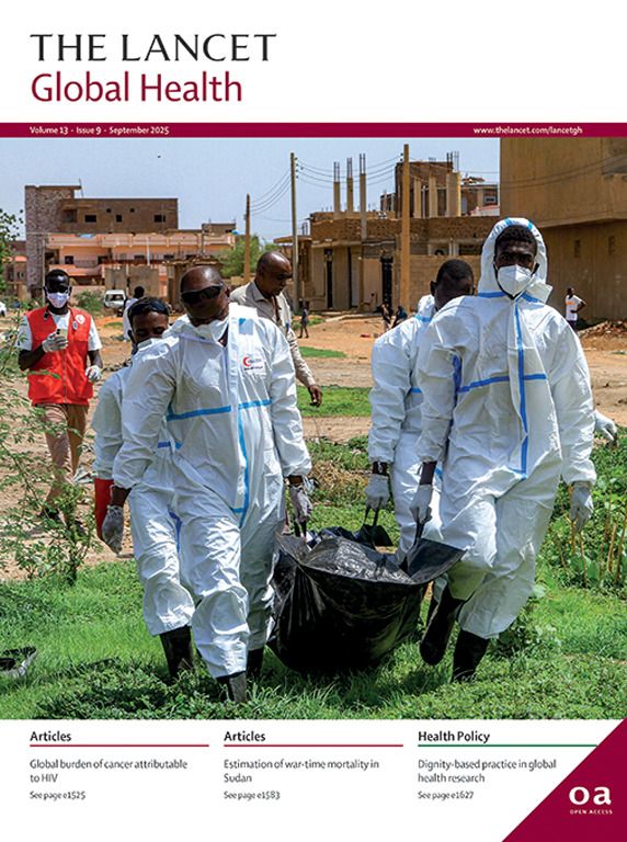 The cover of the September issue of The Lancet Global Health, featuring dark-skinned men in hazmat suits carrying a body bag against a backdrop of destroyed buidings.
Image credit: Ebrahim Hamid / AFP.