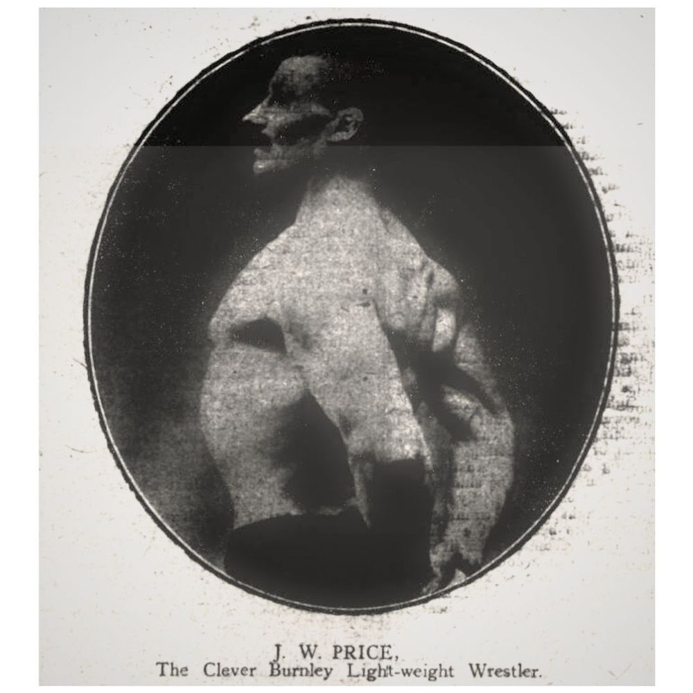 Black and white scanned image from Boxing World in 1908. It's not the best quality. It shows a man in his late 30s facing away from the camera, puffing out his check and flexing his impressive back muscles. Underneath it says J.W.Price The Clever Burnley Lightweight Wrestler