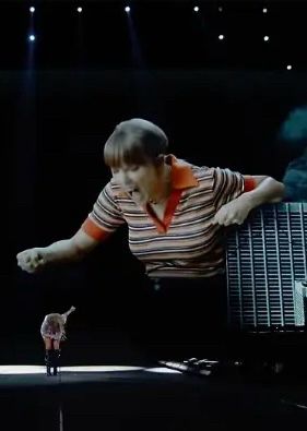 taylor swift on screen screaming during the anti hero performance at the eras tour