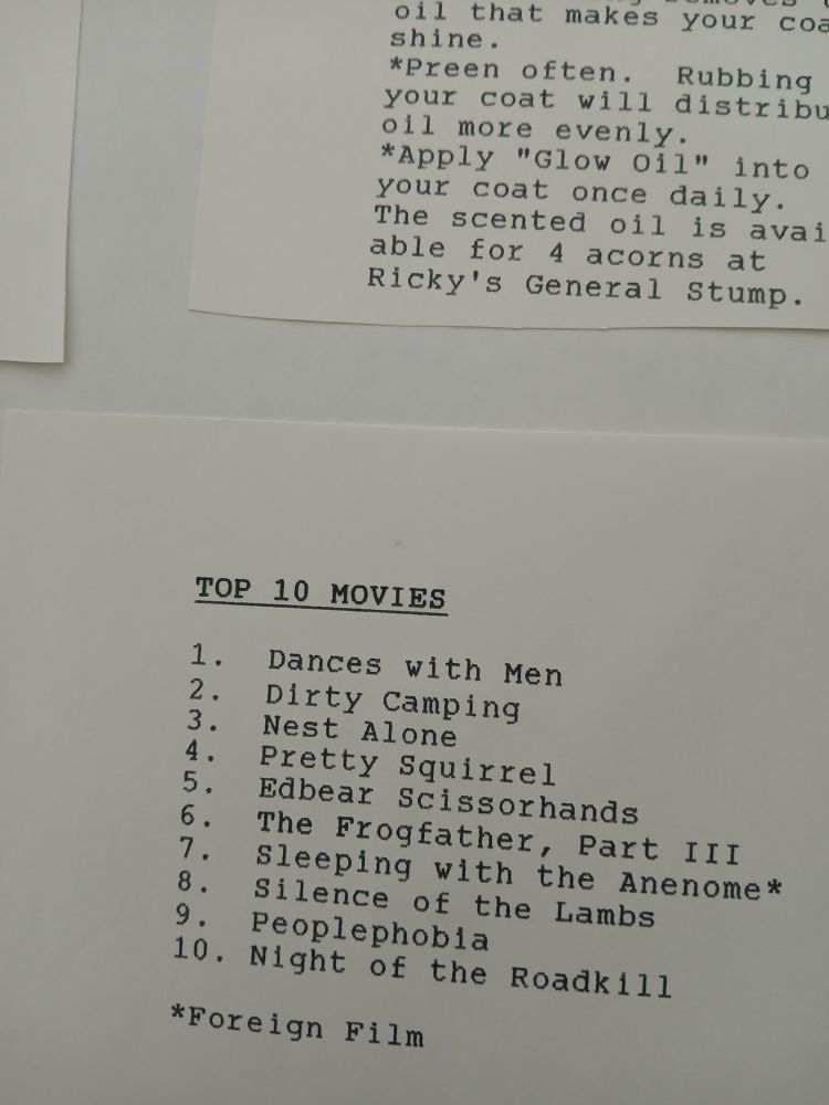 A list of "Top 10 movies" that are all EXTREMELY shitty, early Karla puns. It's ProtoKarla.

(If you can't read this and really want to yell at me, DM me and I will transcribe it  for you personally. I'm otherwise too ashamed to type it out again)