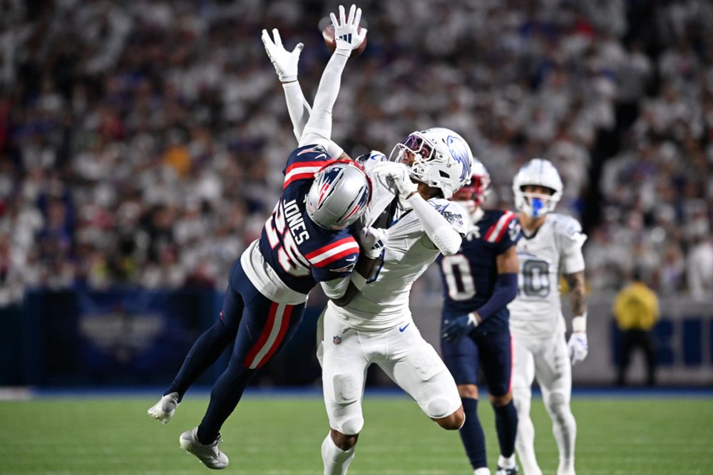 Marcus Jones breaking up a pass against Keon Coleman.