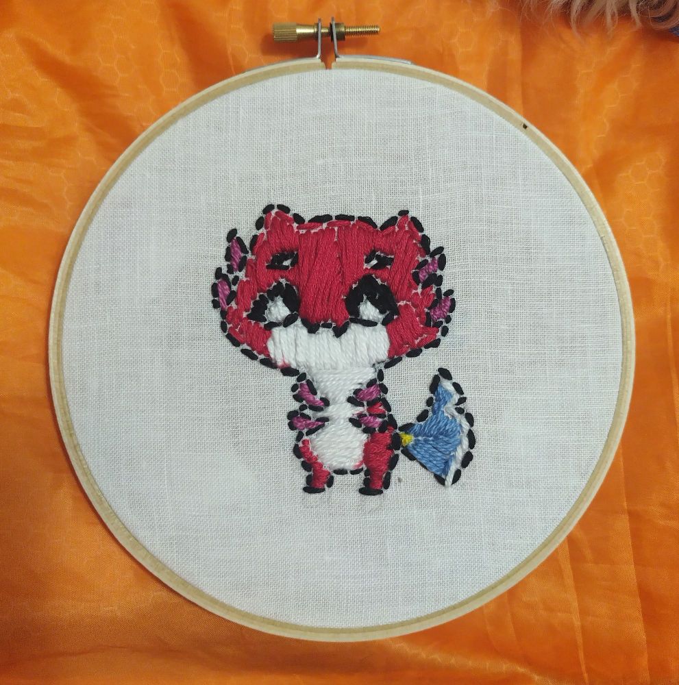 An embroidery piece of a ruzader (fan mascot of Crimzon Ruze)