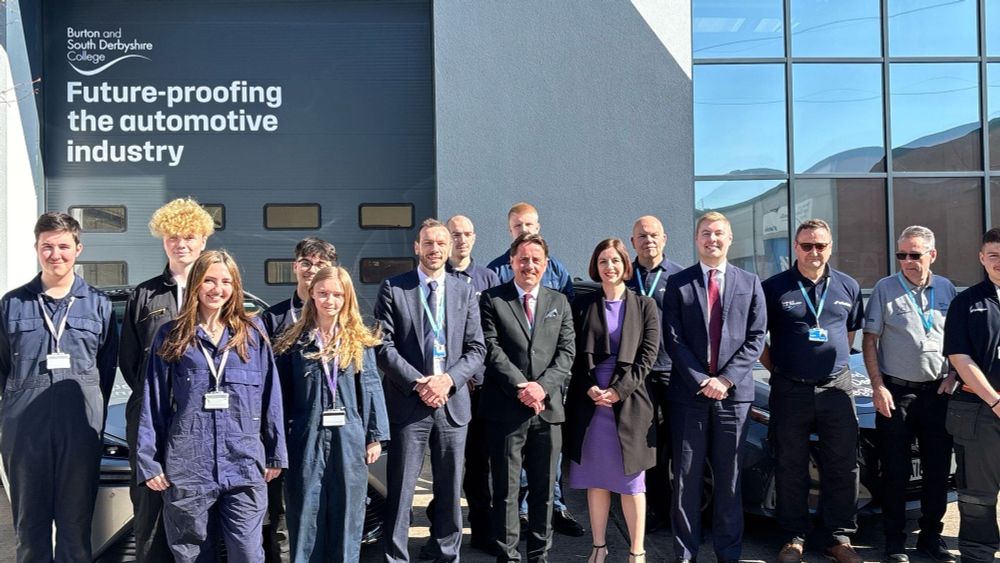 Photograph showing Rt Hon Bridget Phillipson MP, Secretary of State for Education, with Jacob Collier MP, Member of Parliament for Burton & Uttoxeter, and John Beaty, Principal, alongside staff and students of Burton & South Derbyshire College. Burton, April 2025.