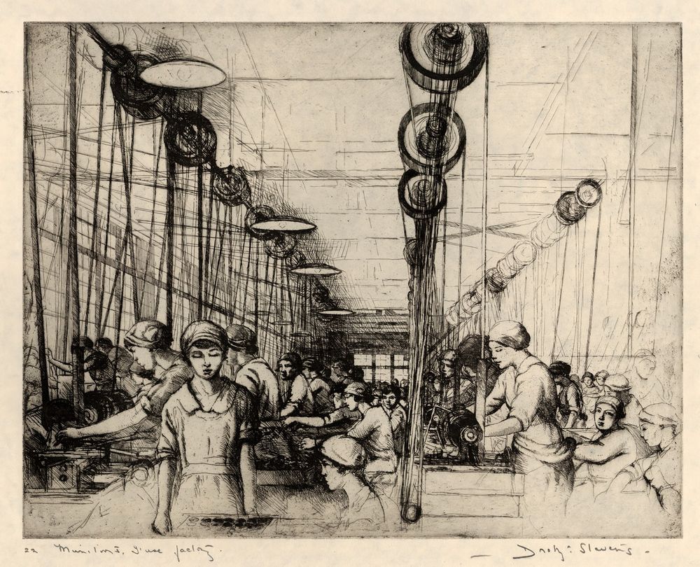 Etching by Dorothy Stevens titled Fuse Factory, showing a crowded interior of a World War I-era munitions factory. Rows of women, all wearing caps and uniform-like dresses, work with machinery under large pulley systems. The perspective leads into the depth of the factory space, conveying the scale and intensity of industrial war labor.