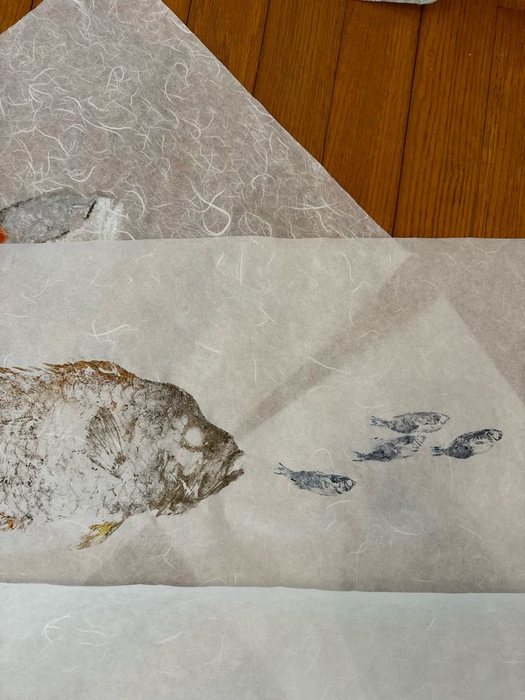 Slingjaw wrasse ink print with damselfishes