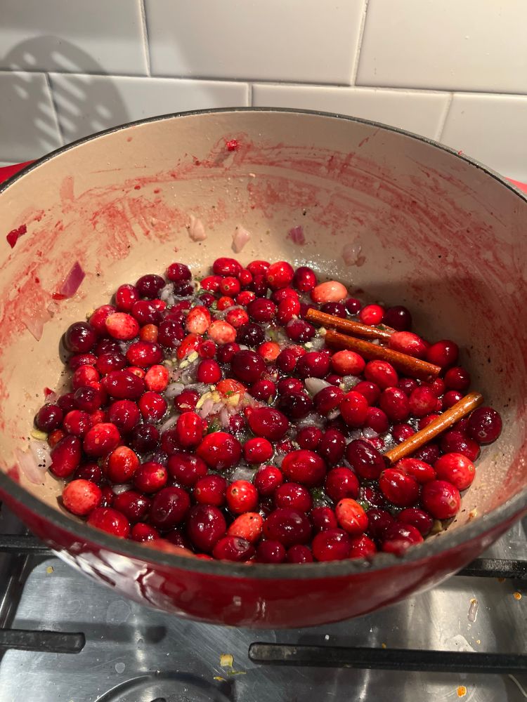 Jalepeno cranberry chutney being made in  Dutch oven 