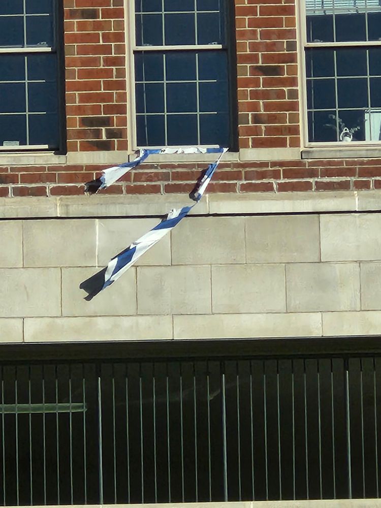 The gash has spread far enough that it is hanging on by a thread