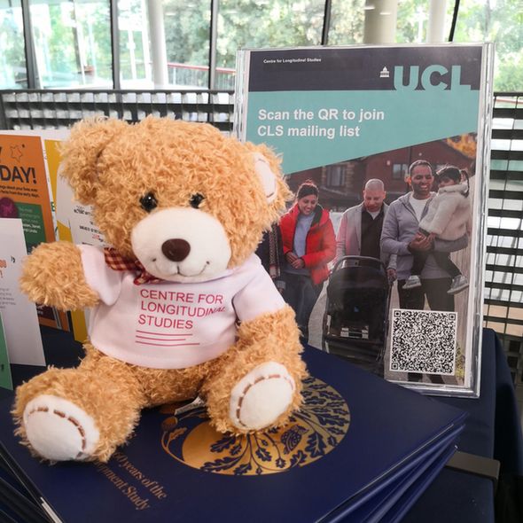 A teddy on a conference stand