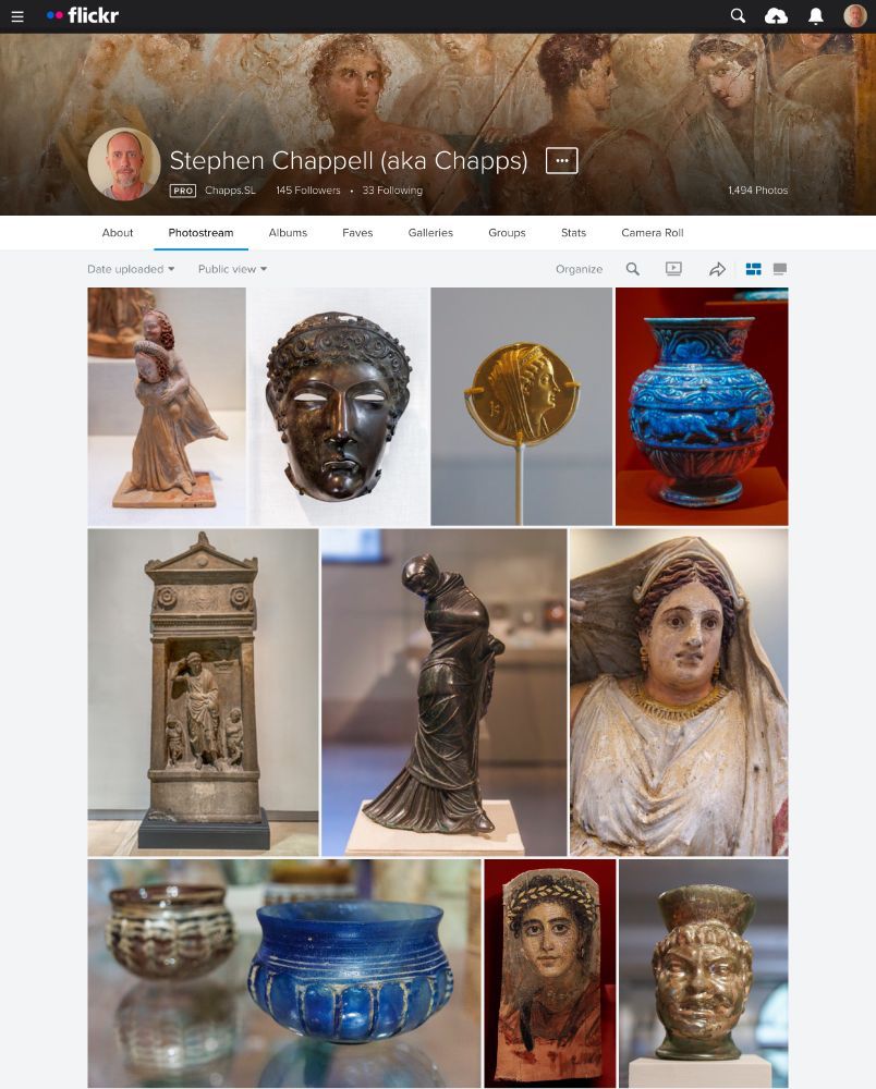 Screen cap of my Flickr Photostream. Labeled ‘Stephen Chappell (aka Chapps)’, at the moment I took the pic, it included things like a terracotta figurine of two girls playing ephedrismos, a bronze Roman cavalry parade helmet, a gold Ptolemaic coin, an Egyptian faience vase, etc. 