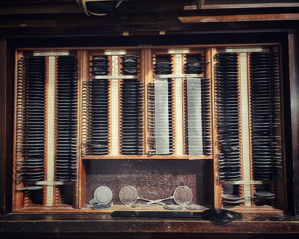 A vintage display of eyeglass lenses seen in optometrist office